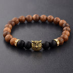 Detail close-up of the exotic wood grain bracelet featuring gold alloy stone accents on a studio background, perfect for s…
