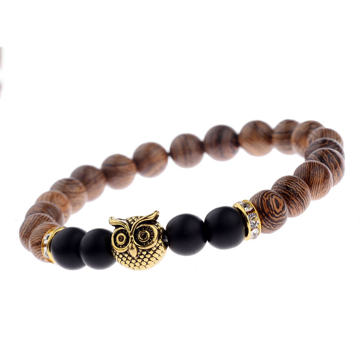 Detail close-up of the exotic wood grain bracelet with an owl charm on a white background, showcasing elegant details.