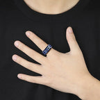 Detail close-up of the blue and rose gold titanium ring showcasing personality design.