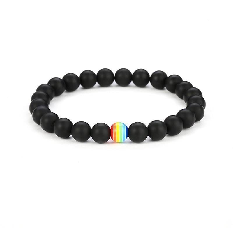 Detail close-up of the black rainbow bead bracelet with a matte finish, showcasing its elegant design.