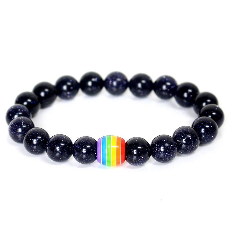 Detail close-up of the blue rainbow bead bracelet showcasing natural stones, emphasizing its colorful charm.