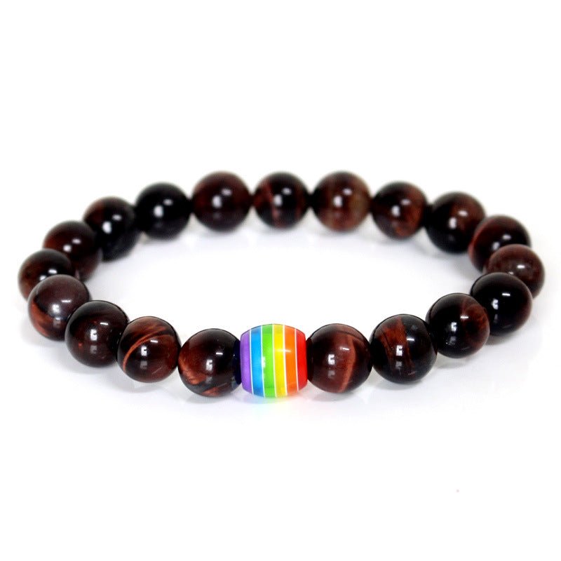 Detail close-up of the brown rainbow bead bracelet highlighting its colorful design on a white background