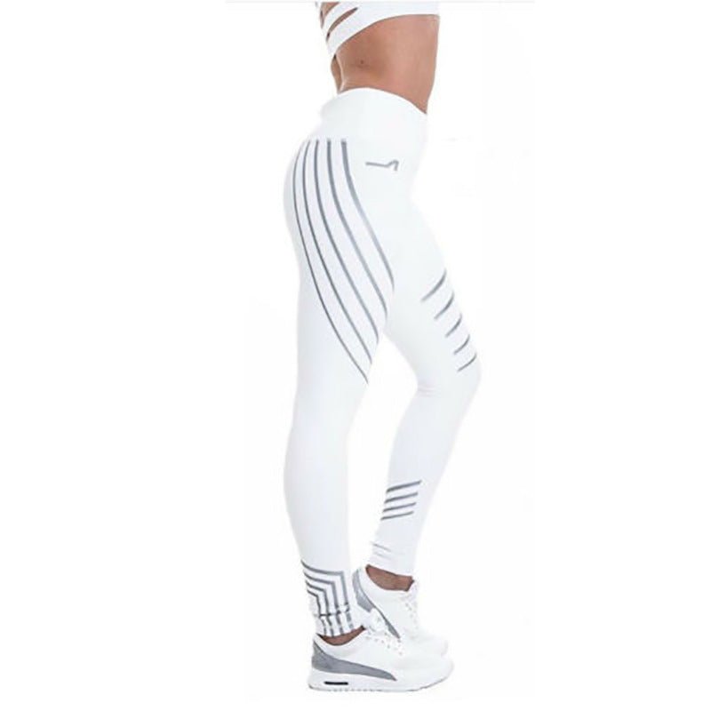 Side view of white reflective sport yoga pants with a striped design and high waist.