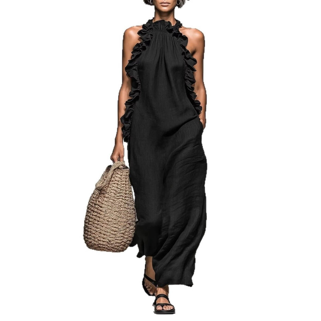Long black ice silk crepe maxi dress with ruffled halter neck in lifestyle shot, perfect for a minimalist wardrobe.