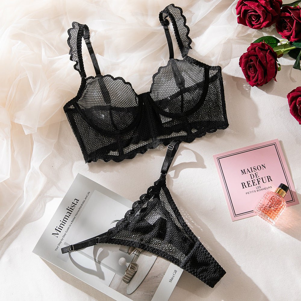 Packaging view of black mesh bra set, showcasing ruffled straps and elegant two-piece design