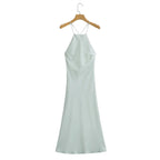 Front view of the light blue satin sling dress, emphasizing its elegant silk texture and long length.