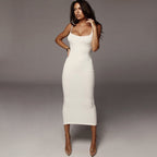 Front view of the white midi dress with contrast straps, chic minimalist style for evening wear