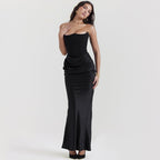 Front view of the black evening gown showcasing a slim fit, perfect for chic evening gatherings.