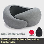 Detail shot of the dark gray travel neck pillow emphasizing its adjustable design and memory foam material.