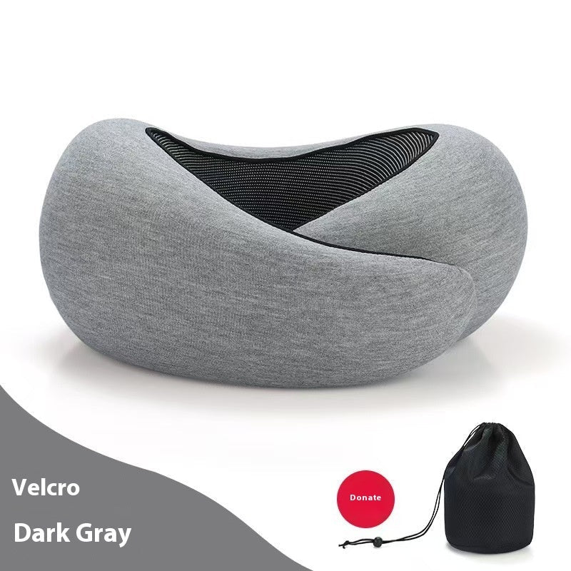 Detail close-up of the dark gray adjustable memory foam travel neck pillow with velvet material.