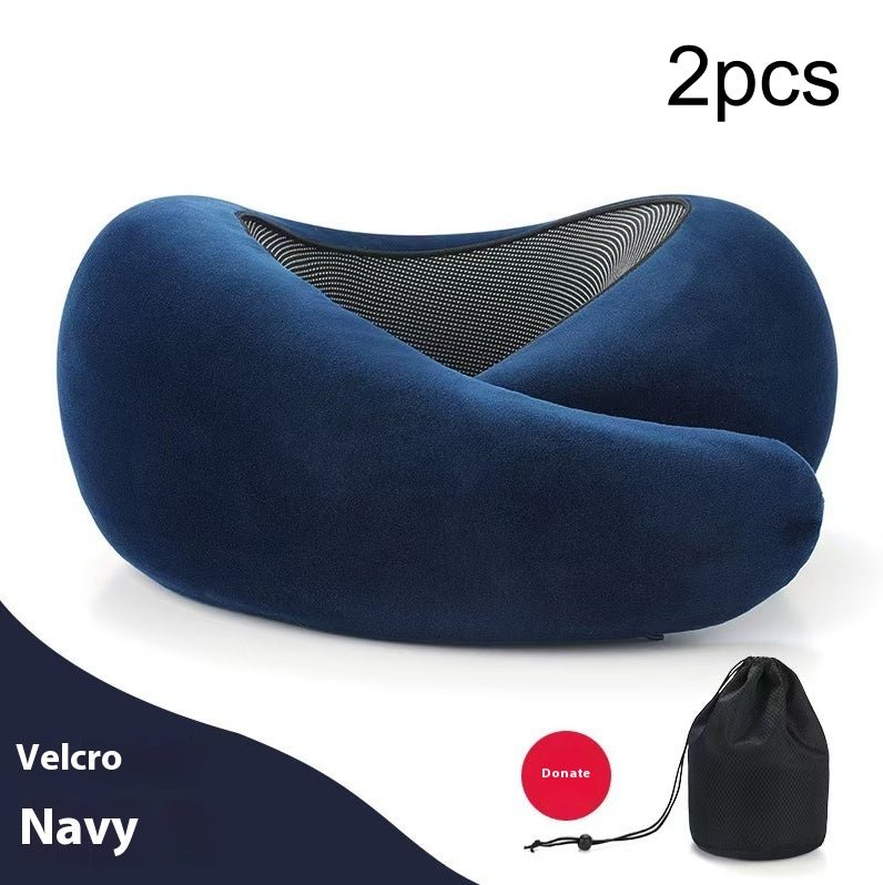 Detail close-up of the dark gray neck pillow, highlighting adjustable features and memory foam.