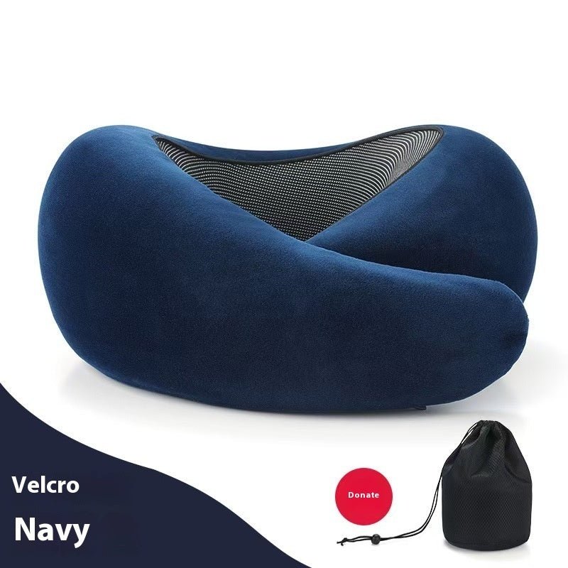 Lifestyle shot of a dark gray neck pillow with adjustable memory foam features.