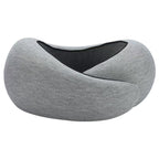 Lifestyle shot of a gray travel neck pillow featuring adjustable memory foam support.