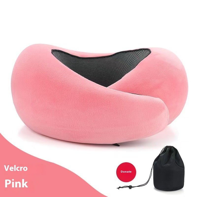 Lifestyle shot of a pink travel neck pillow with adjustable memory foam features.