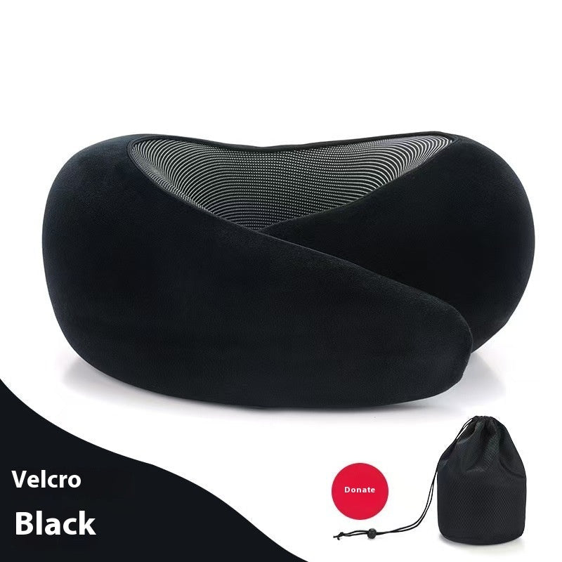 Side view of the dark gray neck pillow, showcasing its adjustable design and memory foam.