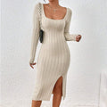 Lifestyle shot of a chic black and white knitted dress featuring a square collar and long sleeves.
