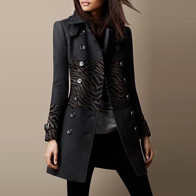 Lifestyle shot of a black wool double-breasted overcoat with elegant lapel collar and pocket details.