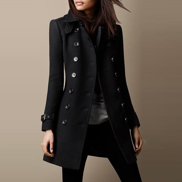 Lifestyle view of a chic black wool double-breasted overcoat showcasing button details and a loose fit.