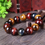 Close-up of the tiger eye bracelet displaying natural stones in brown and gold with a bead design.