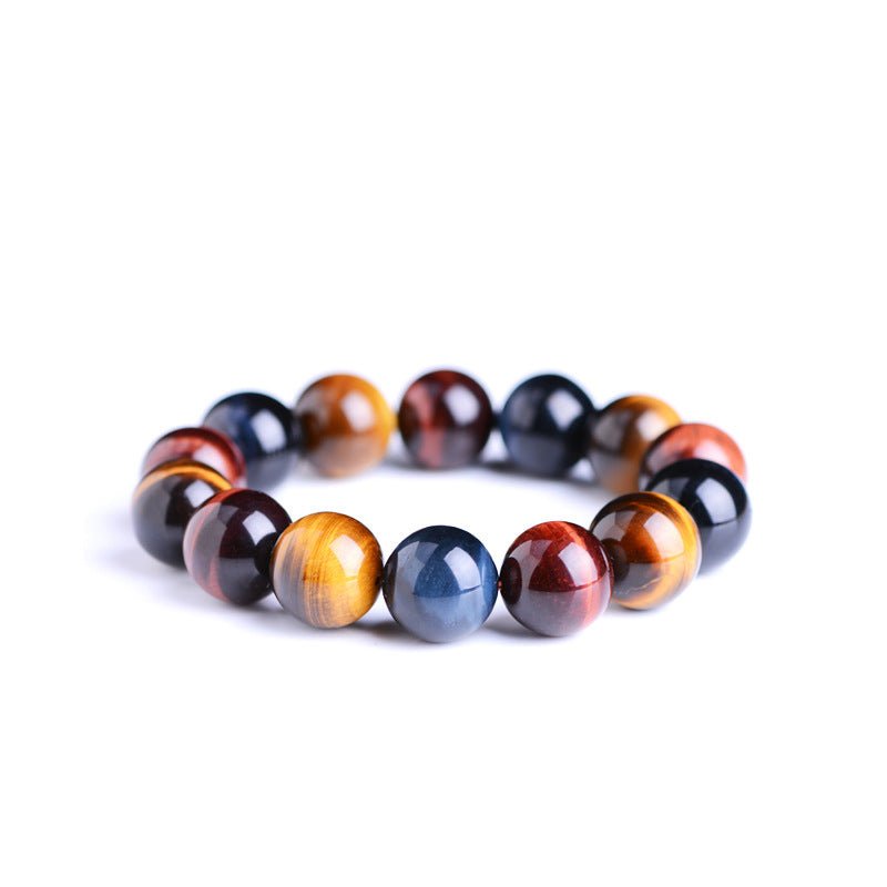Close-up of the tiger eye bracelet showcasing round beads with color variation in brown, black, and gold.