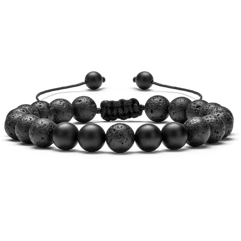 Close-up of black bead bracelet showcasing adjustable closure, smooth bead texture.