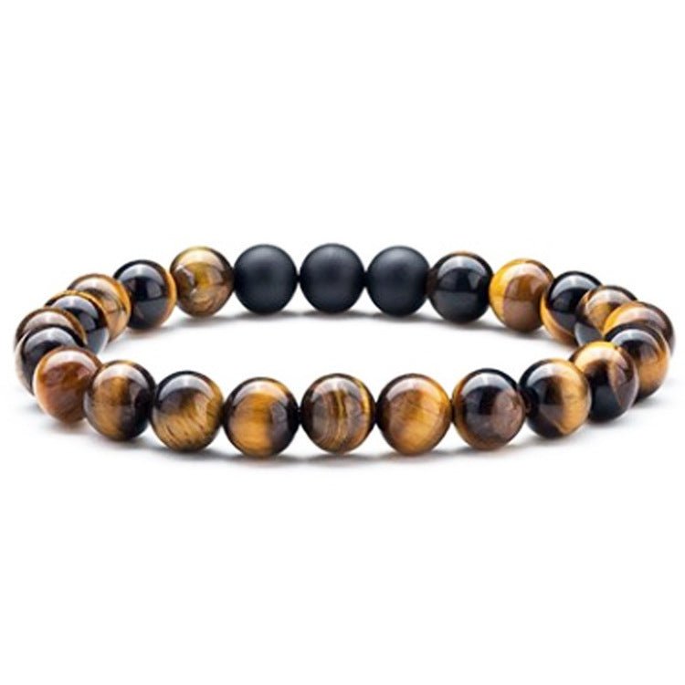 Close-up of bracelet with brown and black beads and beaded design, elegant couple accessory.