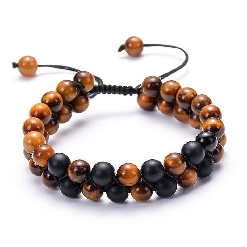 Detail of black bead bracelet showcasing adjustable closure, chic minimalist design.