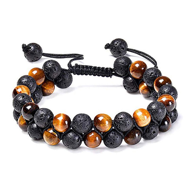Detail close-up of black and orange beaded bracelet with matte finish, stylish couple design.
