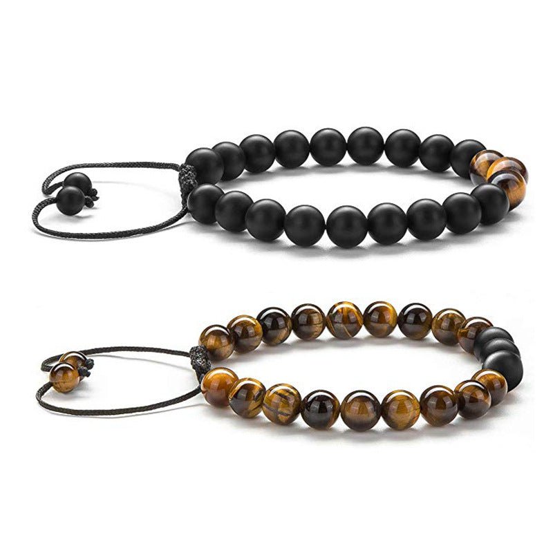 Detail of couple bracelets with matte finish and beaded design, elegant and stylish.
