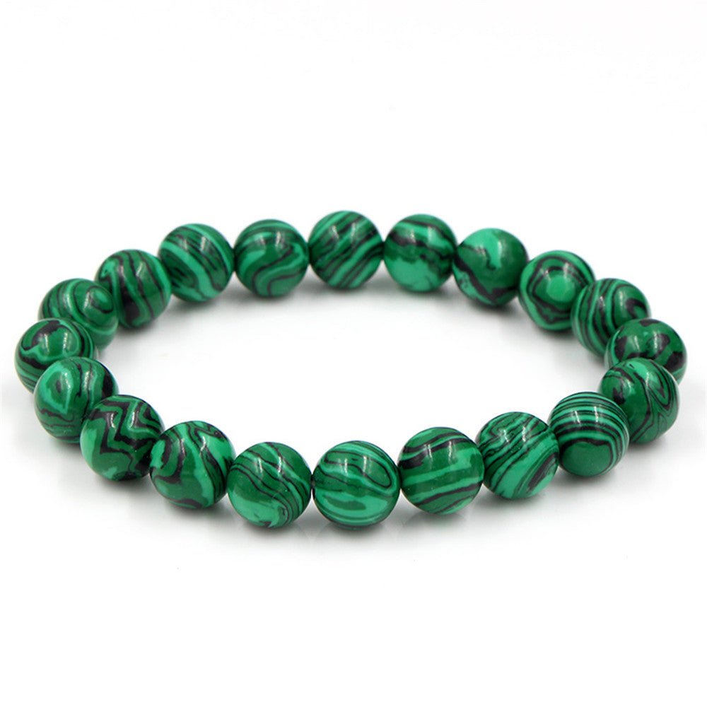 Detail shot of a different bracelet with natural stone and round beads.