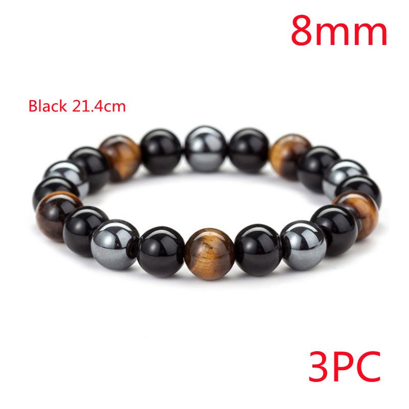 Detail close-up of a tiger eye stone bracelet with 8mm beads in black, brown, and gray.
