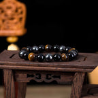 Close-up detail of the tiger eye stone bracelet showcasing natural stones.