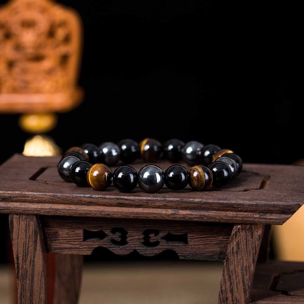 Close-up detail of the tiger eye stone bracelet showcasing natural stones.