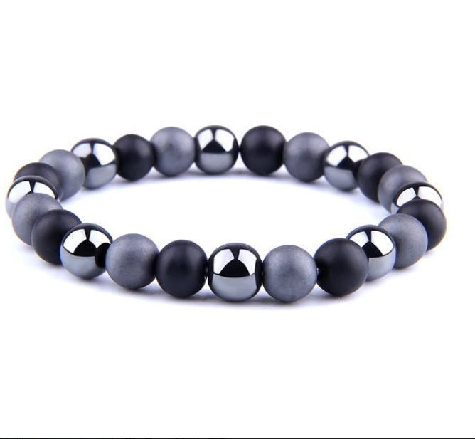Tiger Eye Stone Bracelet with round gray and black beads and metal accents on a white background