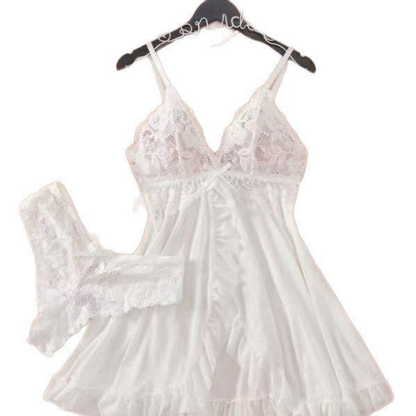 Detail close-up of the white lace camisole set with adjustable straps and elegant lace accents.