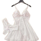 Detail close-up of the white lace camisole set with adjustable straps and elegant lace accents.