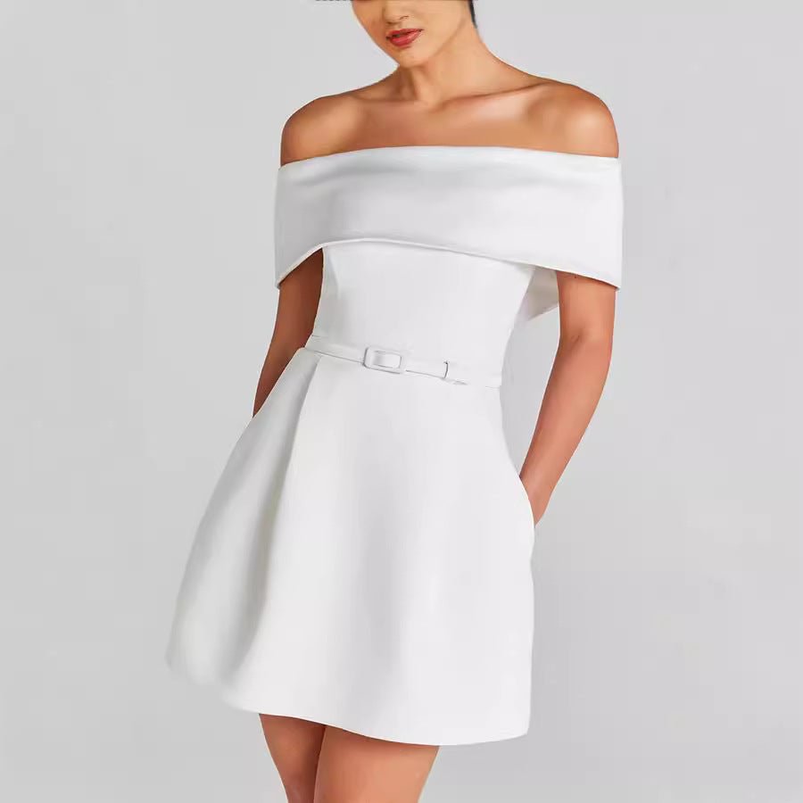 Front view of the white off-shoulder dress featuring a waist belt, elegant and casual look.