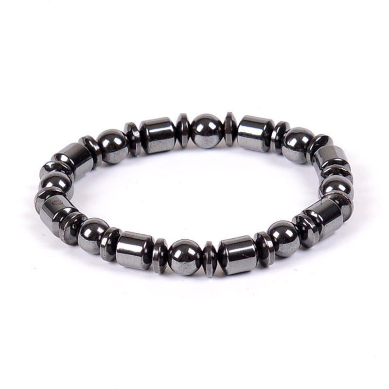 Detail view of black and silver beaded Magnetic Therapy Bracelet on white background, showcasing its unique design.