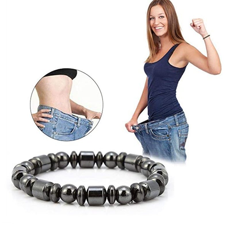 Lifestyle shot of Magnetic Therapy Bracelet worn on wrist in natural setting, displaying its minimalist style.
