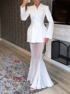 Front view of the white lapel blazer, featuring a polished design and lapel collar in a studio setting.