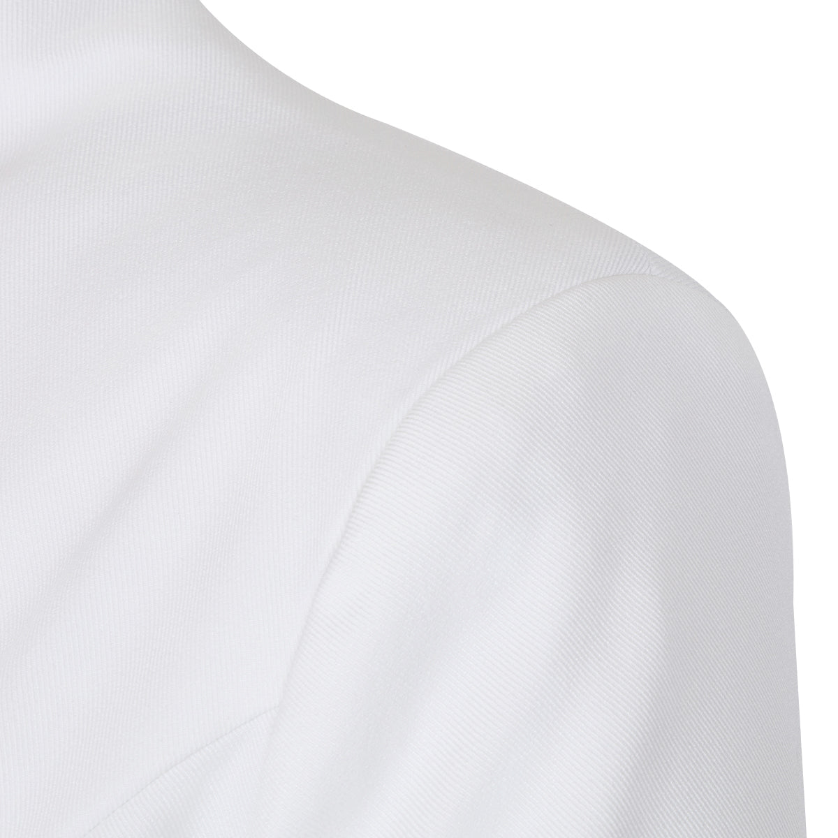 Detail shot of the shoulder area of the white lapel blazer, highlighting its tailored craftsmanship.
