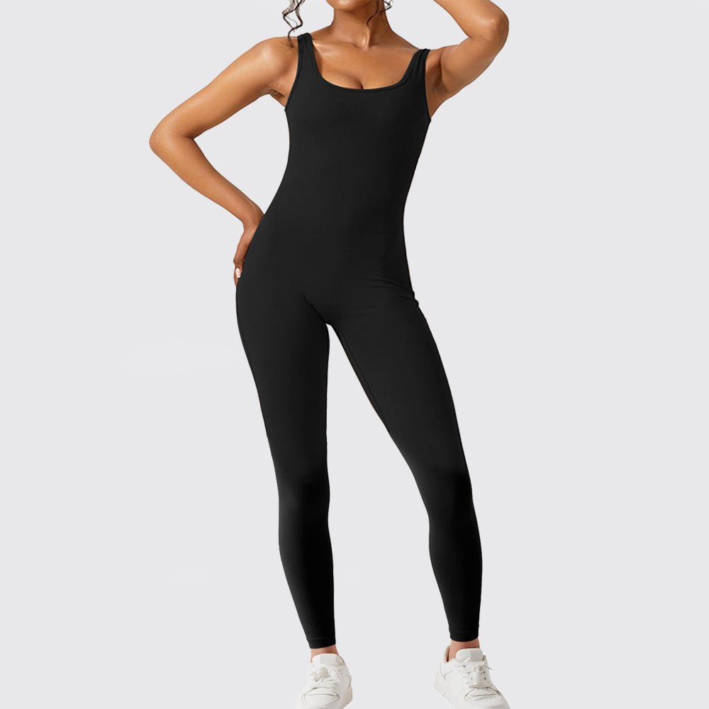 Front view of the black sleeveless flare yoga jumpsuit, showcasing chic minimalist design.