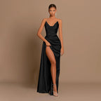 Front view of the black satin maxi dress highlighting the deep V-neckline and backless style, elegant evening wear.