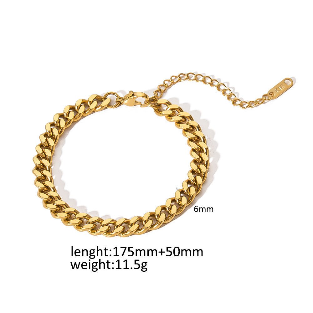 Detail shot of a beaded gold minimalist stainless steel bracelet, emphasizing its stylish design.