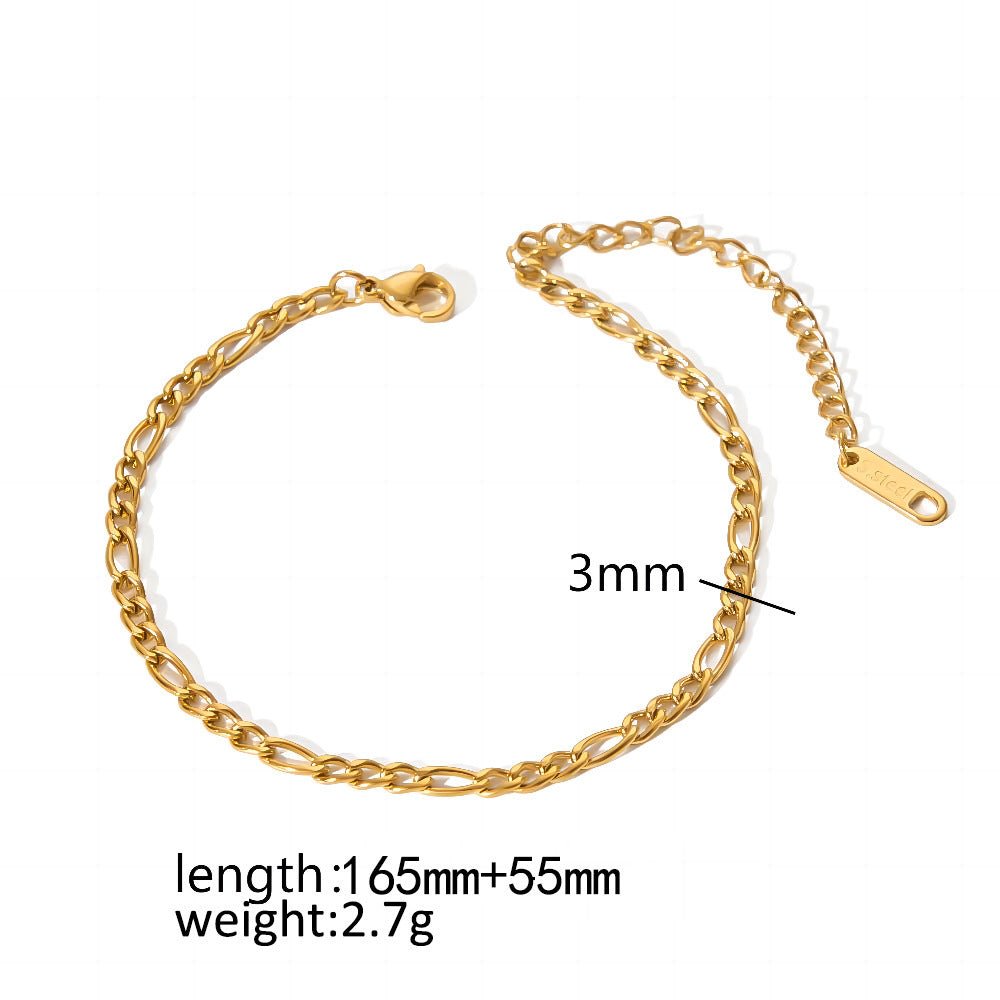Close-up detail of a gold minimalist stainless steel bracelet featuring an adjustable clasp, highlighting its sleek design.