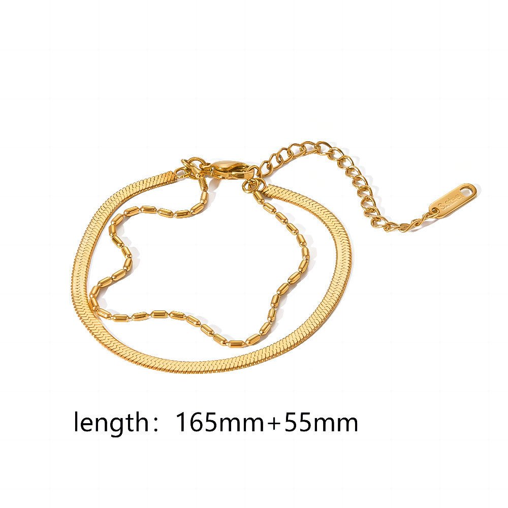 Close-up of a minimalist gold stainless steel bracelet, featuring a simple and elegant style.