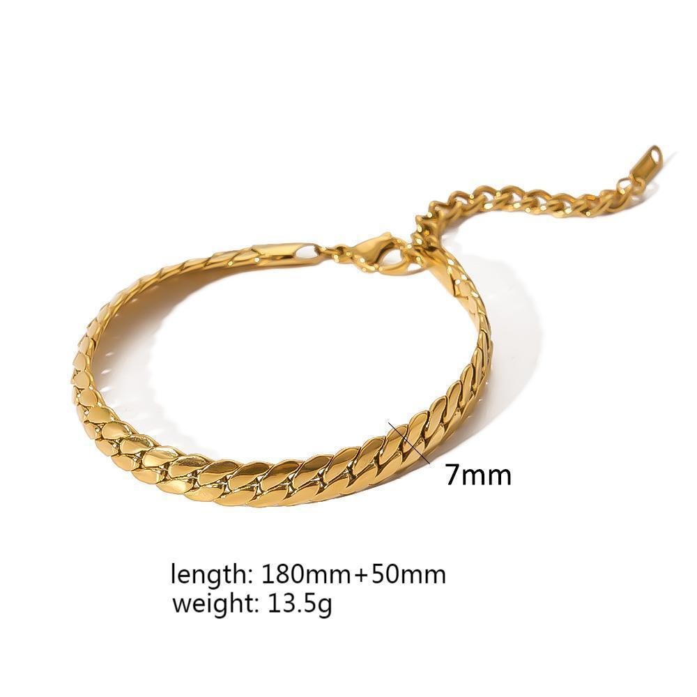 Close-up of a smooth finish gold minimalist stainless steel bracelet, showcasing its elegant simplicity.