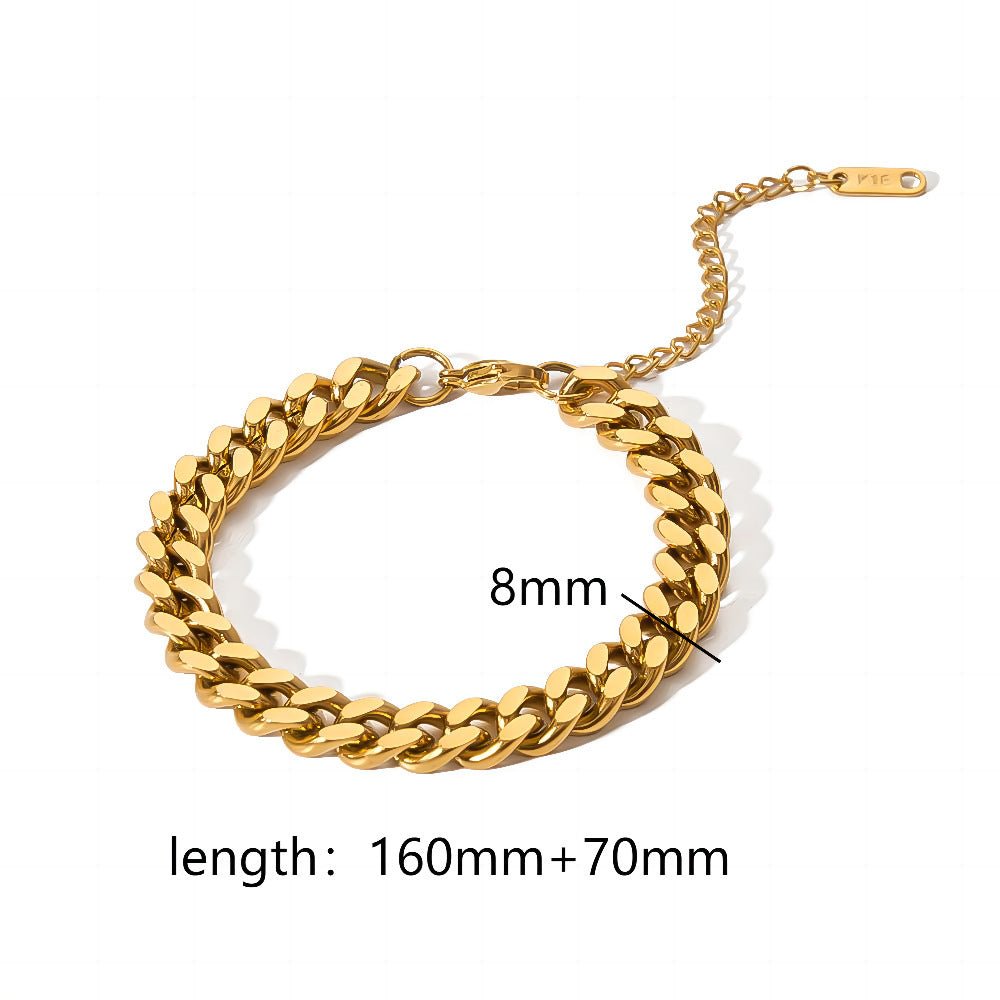 Close-up of a gold minimalist stainless steel bracelet with a mesh design, showcasing its chic look.