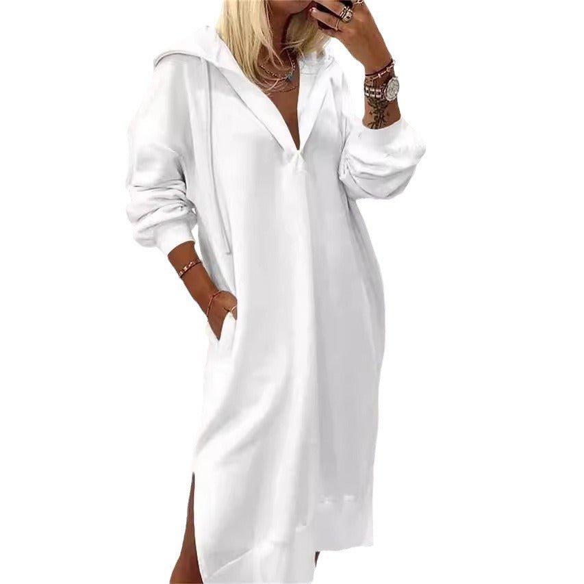 White long dress featuring collared neck and long sleeves on a transparent background.