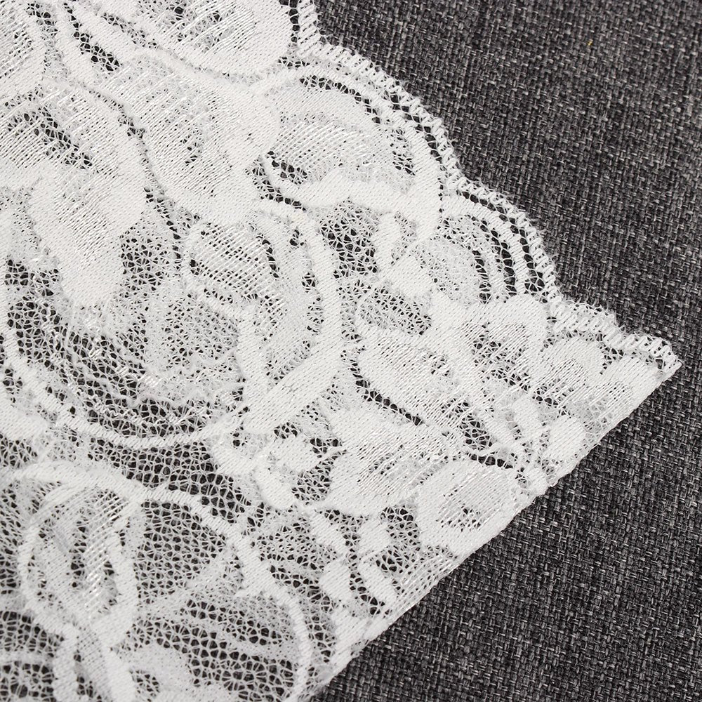 Detailed view of white lace detail on high-waist thong, elegant and stylish for everyday wear